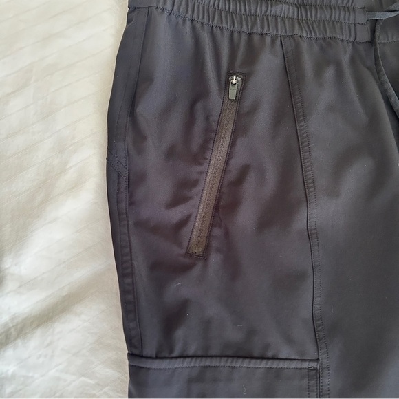 Athleta Unbound Black Jumpsuit Sleeveless Drawstring Waist Pockets size Large - Picture 11 of 15